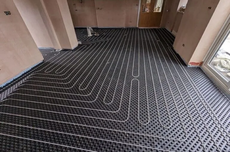 Plancher chauffant dalle à plots